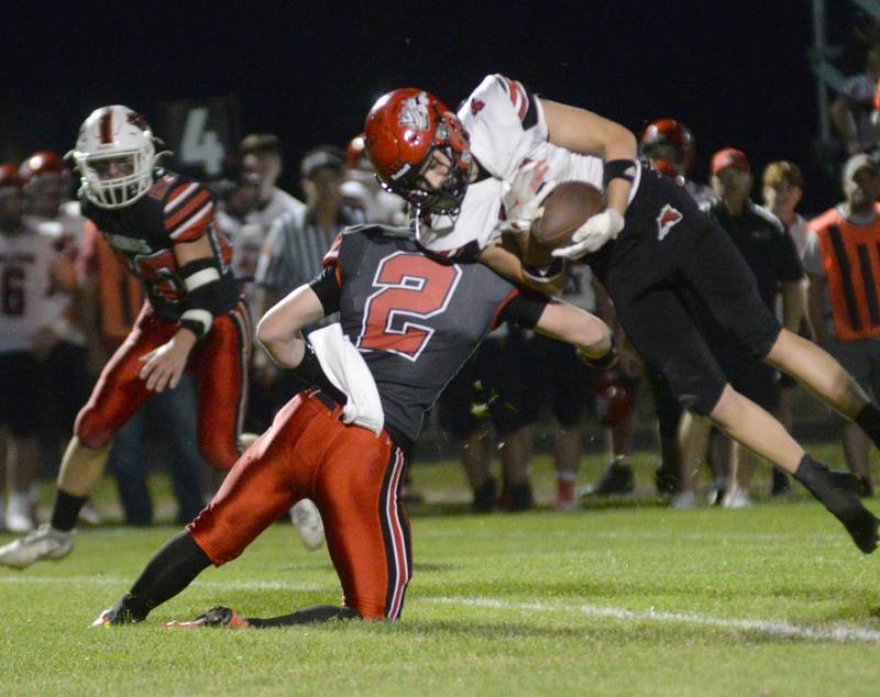 Forreston's Connor Politsch (2) tackles Fulton's Caden Wilkin after a catch during action in Forreston on Friday, Sept. 12, 2025.