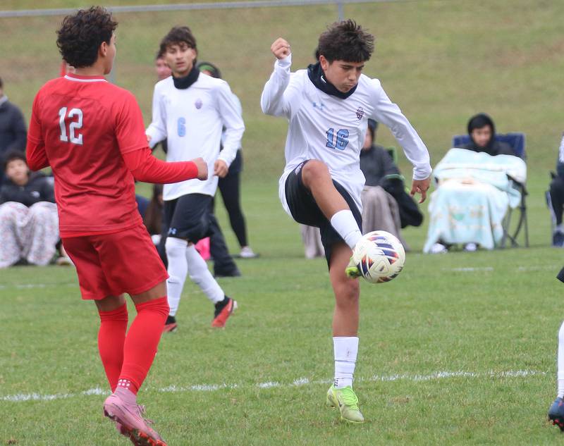 Kankakee's Jason Lopez kicks the ball away from L-P's Adan Pantoja during the Class 2A Regional title game on Saturday, Oct. 25, 2025 at Ottawa High School.