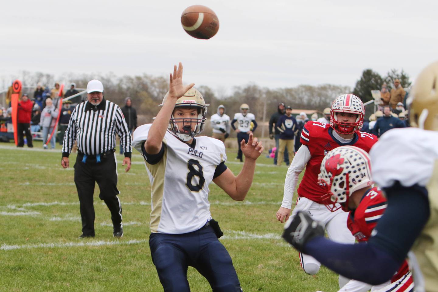 Polo quarterback Tyler Merdian (8) passes the ball to Kahlil Sankey for a 2-point conversion during the first half of the Marcos' 8-Man semifinal playoff game against West Central on Saturday, Nov. 13, 2021 in Biggsville.