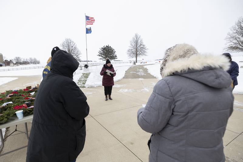 Laurie Carlin-Perry, representative of the Rochelle Chapter of the Daughters of the American Revolution, begins a Wreaths Across America ceremony Saturday, Dec. 13, 2025, at Palmyra Cemetery in Dixon.