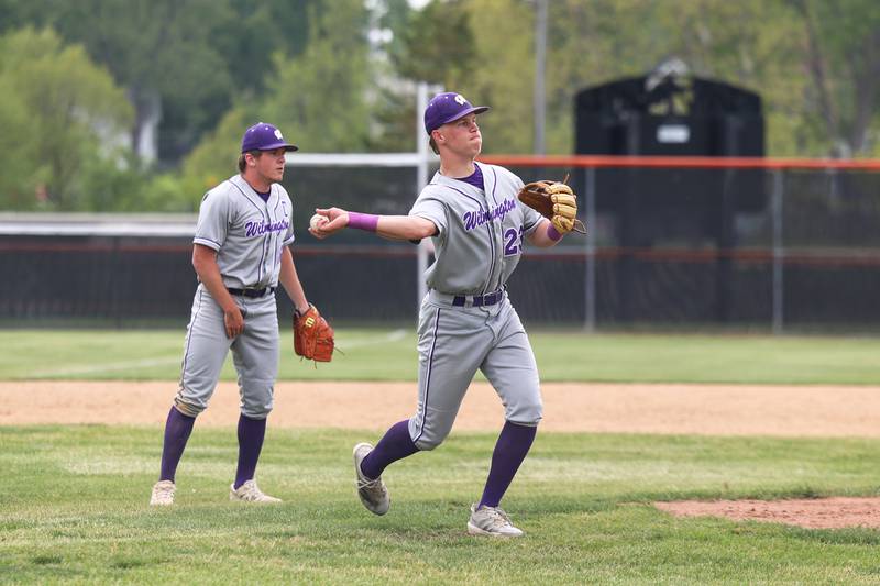 Wilmington's Cooper Holman throws to first for an out during the Wildcats' 7-2 victory over Chicago Christian in the IHSA Class 2A Beecher Sectional semifinal on Thursday, May 29, 2025.