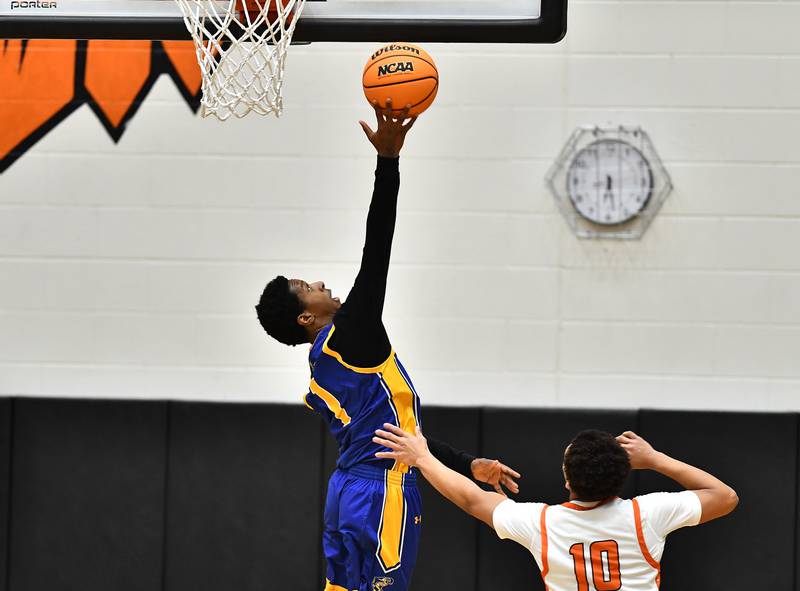 Joliet Central's Bernal Fox (1) goes up for a shot during the 4A Lockport Regional game against Lincoln-Way West on Monday, FEB. 23, 2026, at New Lenox.