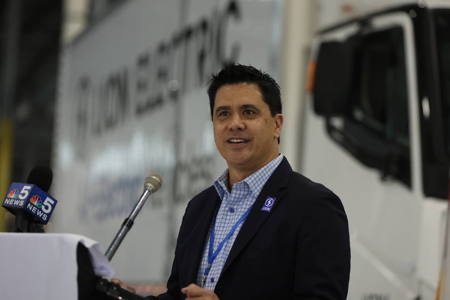 Nate Baguio, Senior Vice President of Commercial Development for Lion Electric, speaks during a press conference and interactive tour of the Lion Electric vehicle manufacturing facility. Monday, Mar. 21, 2022, in Joliet.