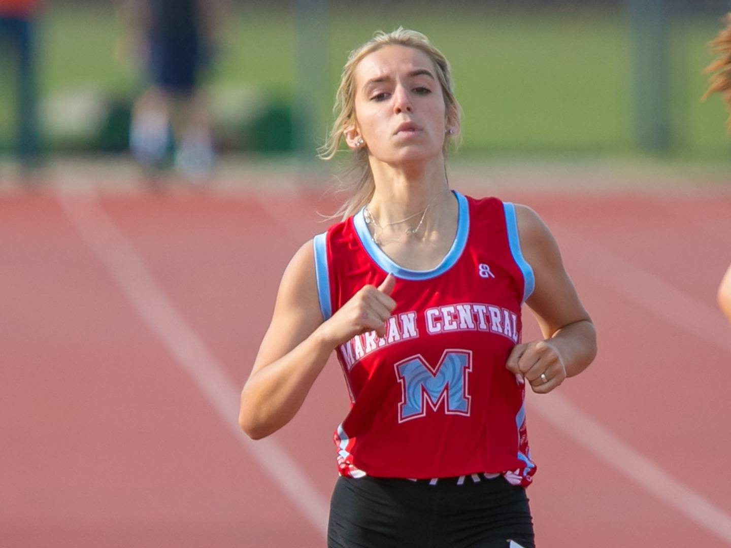 Marian Central's Bella Zecchin finishes second place in the 400-meter run on June 2, 2021 at the Class 2A Carmel Sectional in Mundelein.