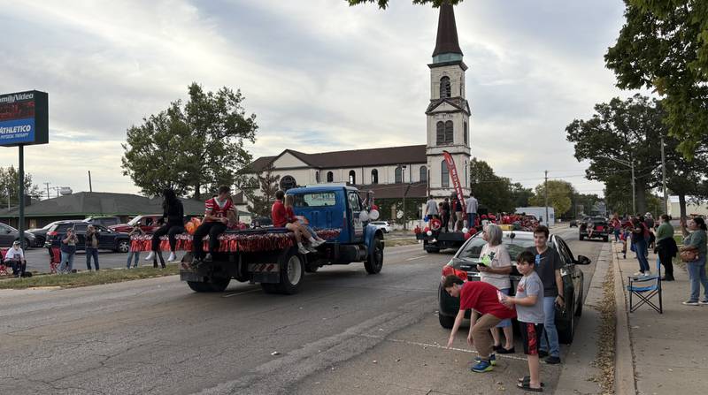 The Streator High School senior homecoming court rides past City Park during the school’s homecoming parade Wednesday, Oct. 1, 2025, in downtown Streator.
