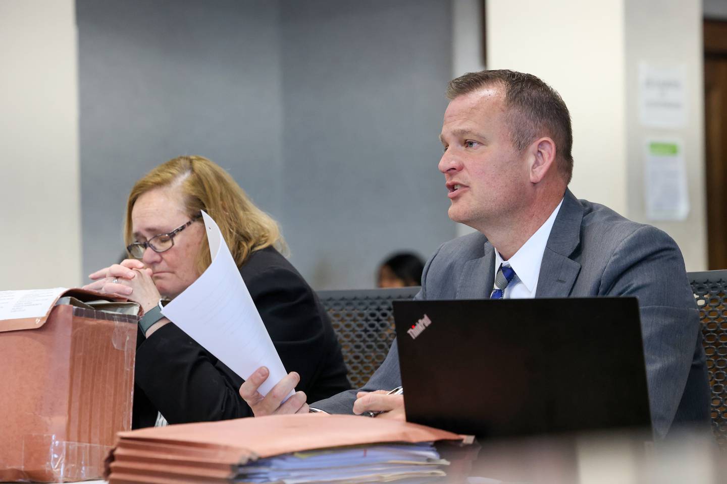 Kankakee County State's Attorney Jim Rowe, right, and First Assistant Kankakee County State’s Attorney Carol Costello react to a list of questions from the defense during court proceedings ahead of the trial for Xandria Harris on Friday, Feb. 13, 2026.