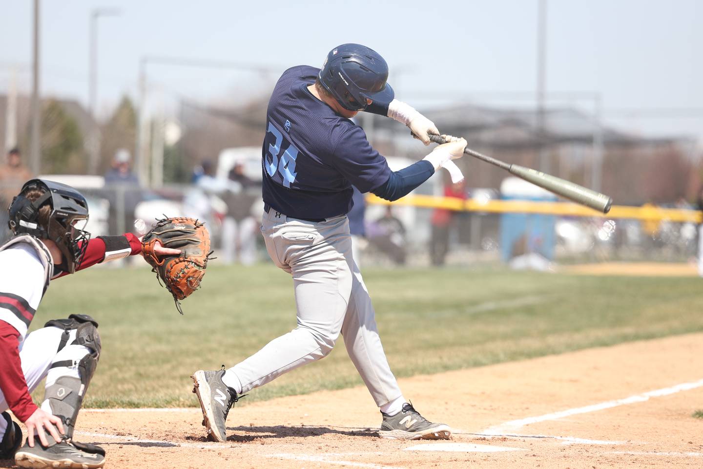 Plainfield South’s Daniel McCauley drives in a run on a fielders choice against Plainfield North on Friday, April 7, 2023.