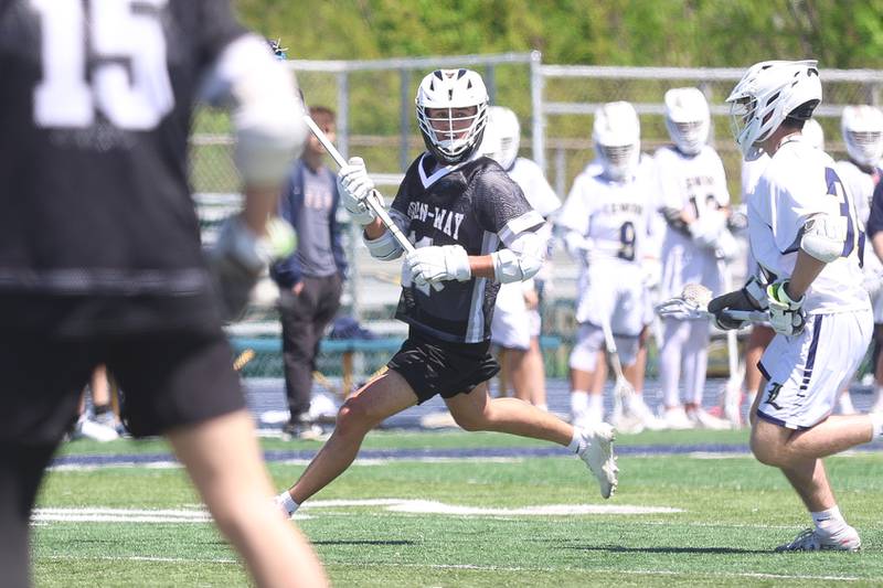 Lincoln-Way’s Will Deady looks for a play against Lemont on Saturday, April 25, 2026 in Lemont.