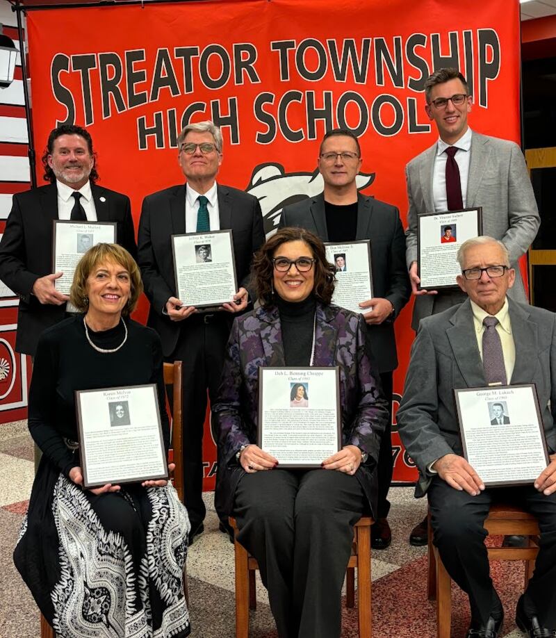 Streator Township High School Worthy Hall of Fame inductees were introduced Saturday, Dec. 7, 2024, at a ceremony at the high school. Pictured are (from front, left) Karen Melivn (Class of 1972), Deb Benning-Chiappe (Class of 1981) and George Lukach (Class of 1963) (back, from left) Brad Brittin on behalf of Capt. Michael Linden Mulford (Class of 1957), Jeffery Walker (Class of 1978),  Donald Melose Jr. (Class of 1987) and Dr. Vincent Siebert (Class of 2009).