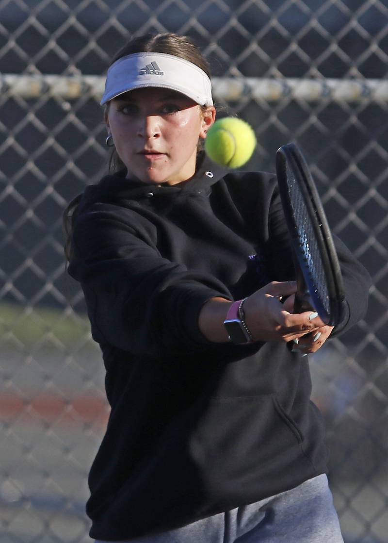 Wauconda's Reagan Mohr returns the ball Thursday, Oct. 23, 2025, during the first day of the IHSA State Girls Tennis Tournament at Schaumburg High School.