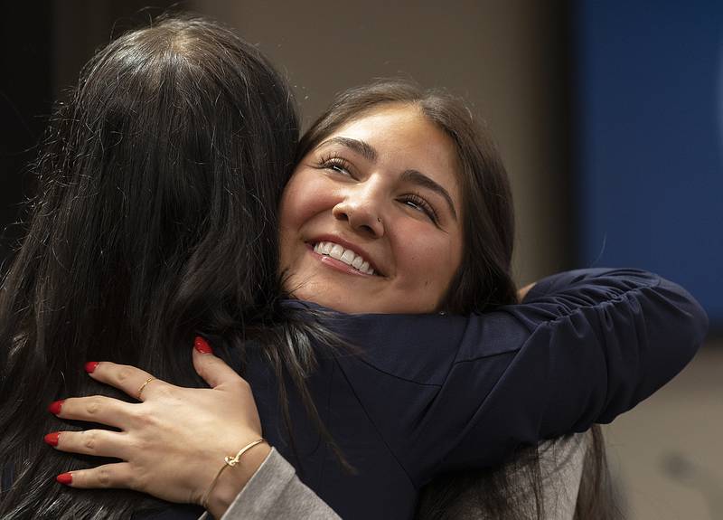 Sterling graduate and standout volleyball star Lexi Rodriguez hugs Sterling mayor Diana Merdian Monday, Dec. 23, 2024, after being given the key to the city.