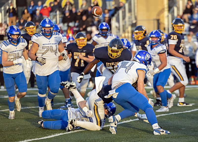 The ball gets loose from Sterling’s Cale Ledergerber as he fumbles against St. Francis Saturday, Nov. 4, 2023 in a class 5A playoff game in Sterling.