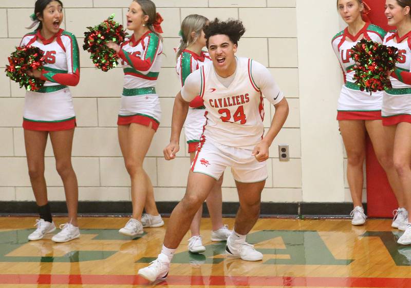 L-P's Marion Persich reacts after dunking the ball against Ottawa on Friday, Feb. 7, 2025 in Sellett Gymnasium at L-P High School.