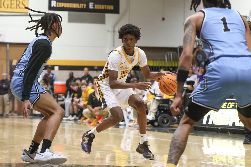 Joliet West’s Abrey Robinson looks to make a play against Kankakee on Wednesday, Feb. 18, 2026 in Joliet.