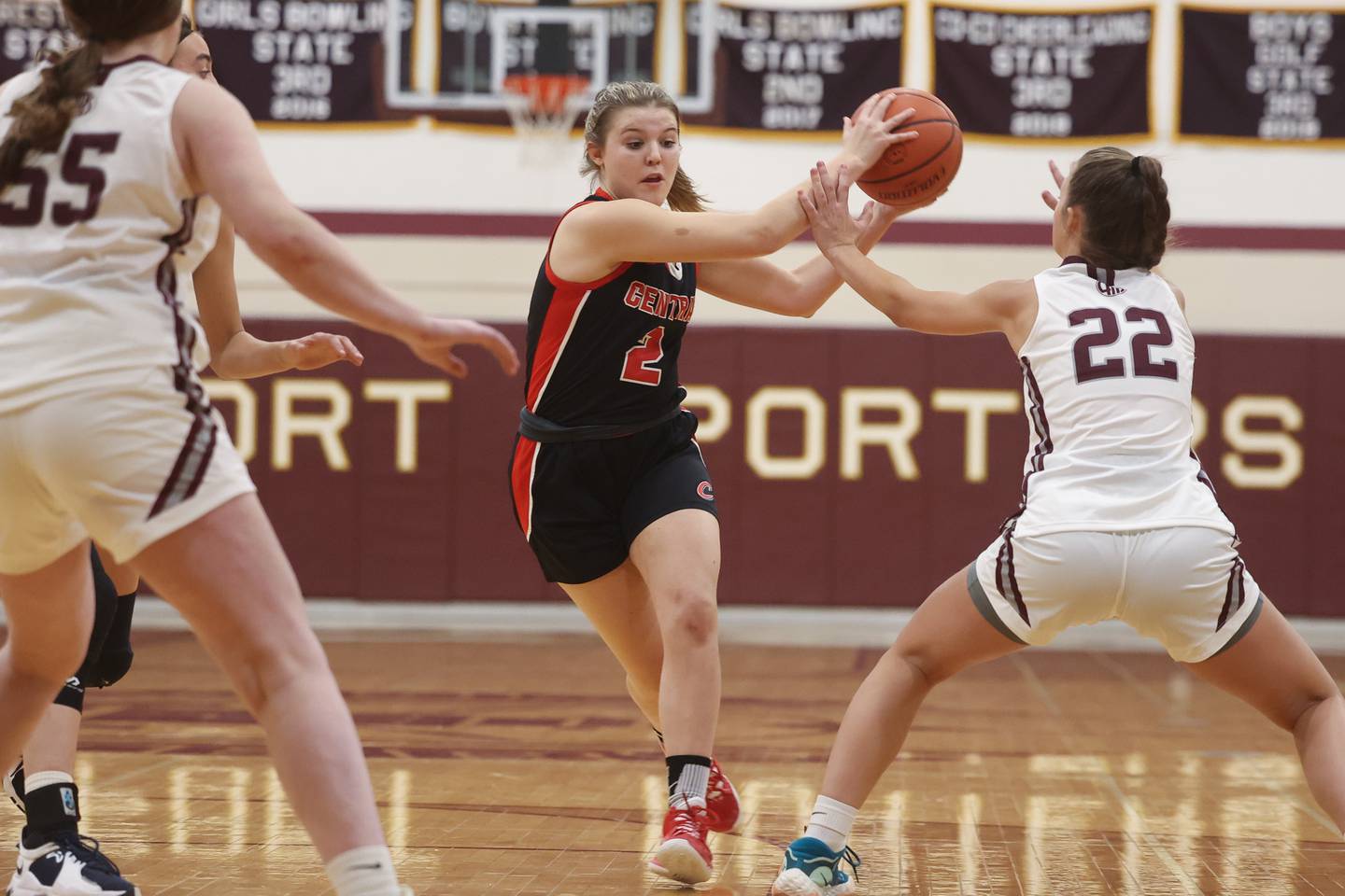 Lincoln-Way Central’s Gracen Gehrke drives to the basket against Lockport.