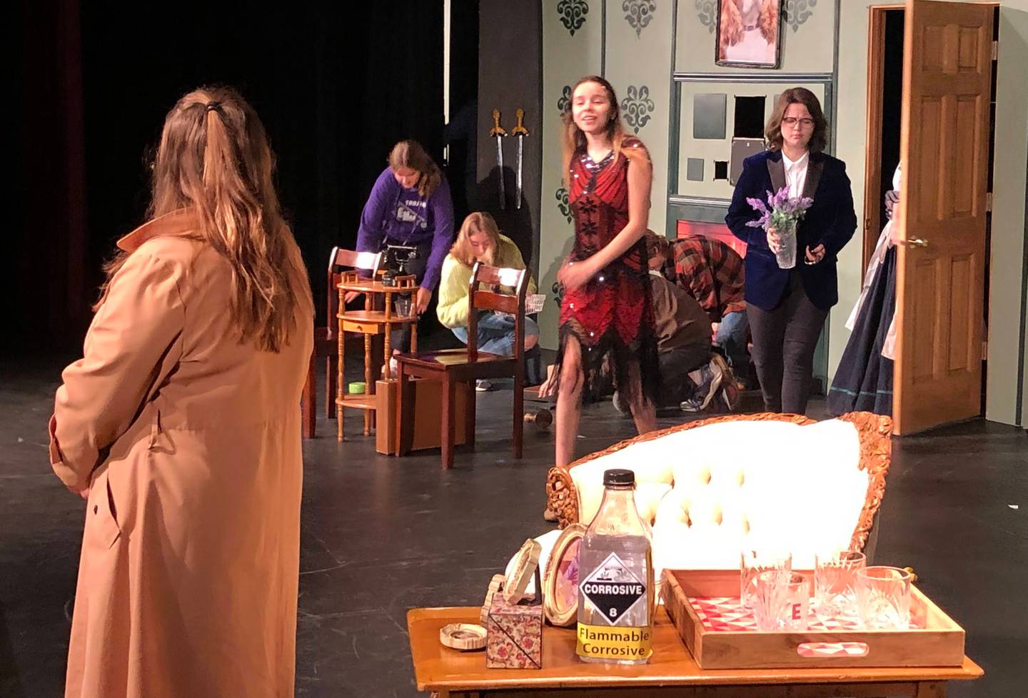 Cast members from the Mendota High School drama club walk on the stage while rehearsing "The Play that Goes Wrong" on Tuesday, Oct. 11, 2022