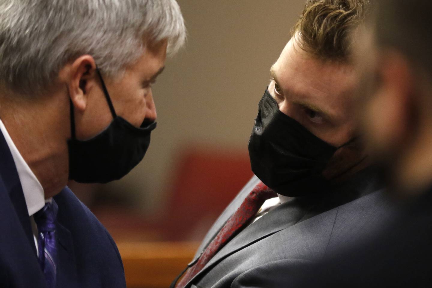 Defense attorney Scott Anderson, left, talks with Assistant State's Attorney Matthew Brodersen during court with Judge Michael Coppedge Wednesday, Nov. 24, 2021, at the Michael J. Sullivan Judicial Center in Woodstock.