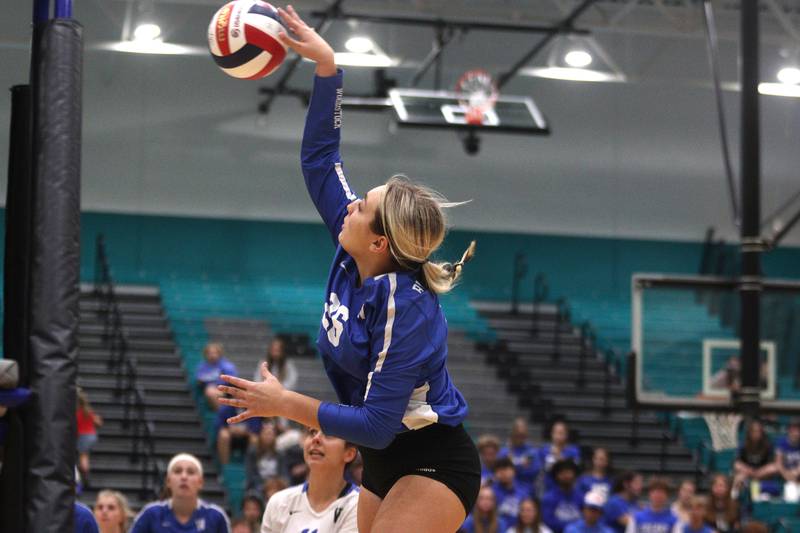 Woodstock’s Kennedy Cordell sends the ball over the net in varsity volleyball at Woodstock North Monday night.