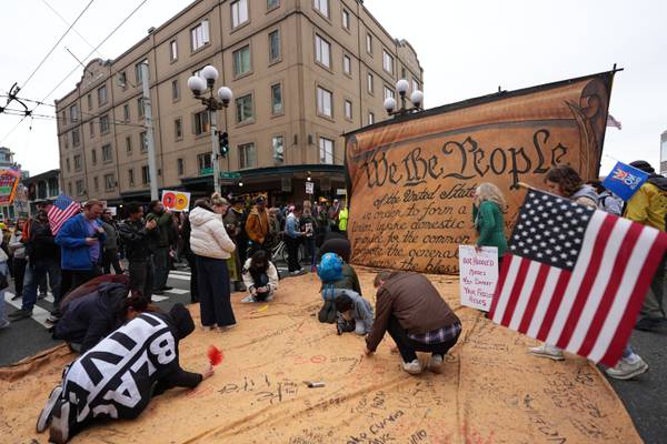 ‘No Kings’ protests against Trump bring a street party vibe to cities nationwide