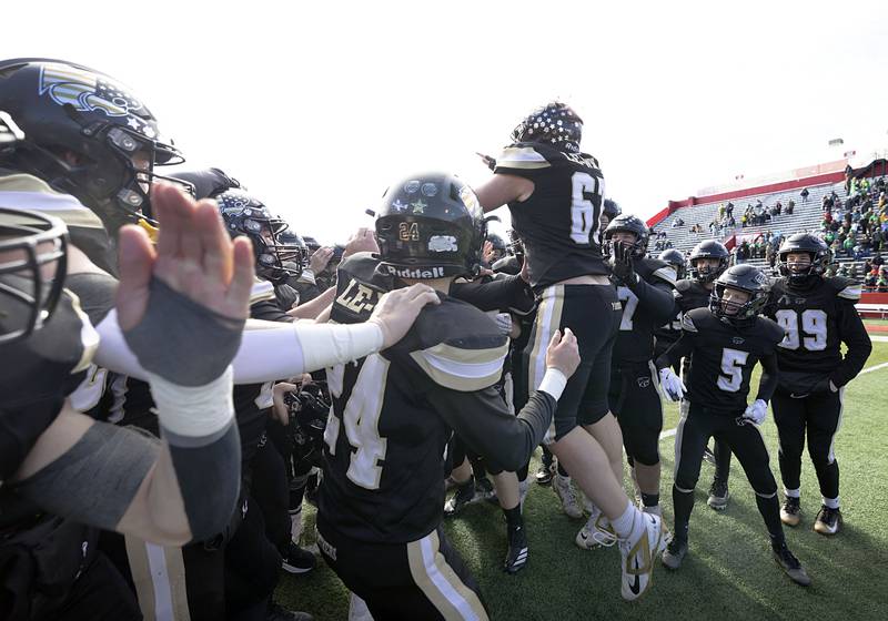 Lena-Winslow celebrates their 58-13 victory over Brown County Friday, Nov. 28, 2025, in the Class 1A football finals at Hancock Stadium at ISU.