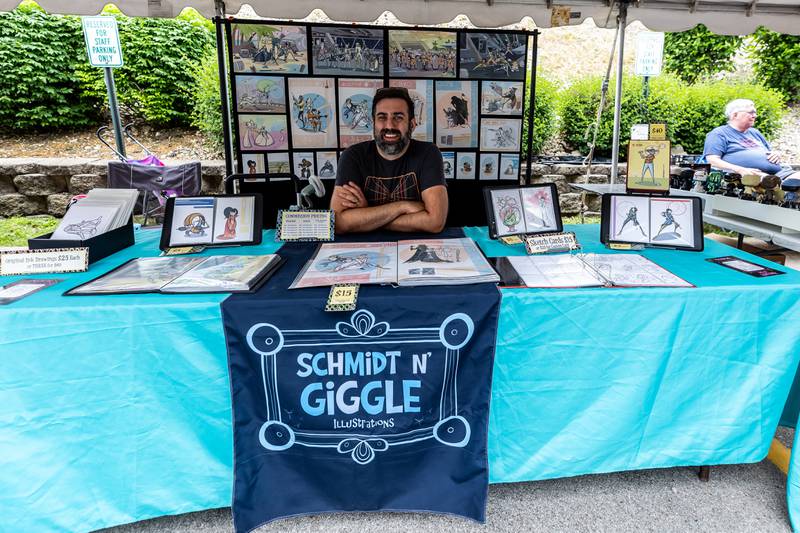 Artist Greg Schmidt hosts a booth during Joliet Public Library's Star Wars Day event on June 7, 2025.