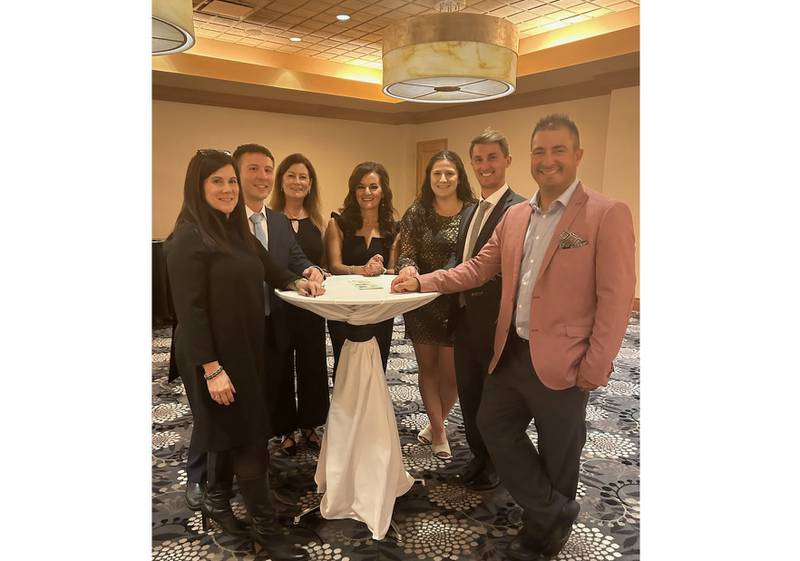 The American Italian Cultural Society in Crest Hill hosted its 93rd anniversary Columbus Day Banquet on Oct. 8 at Harrah’s Joliet and awarded two college scholarships. Pictured, from left, are members of the scholarship committee: Tanja Conte, Jason Miller, Lynn Coladipietro, Danielle DiVecchio Adolph, Marisa Serafini, Bryan Wellner and Dan Brandolino.