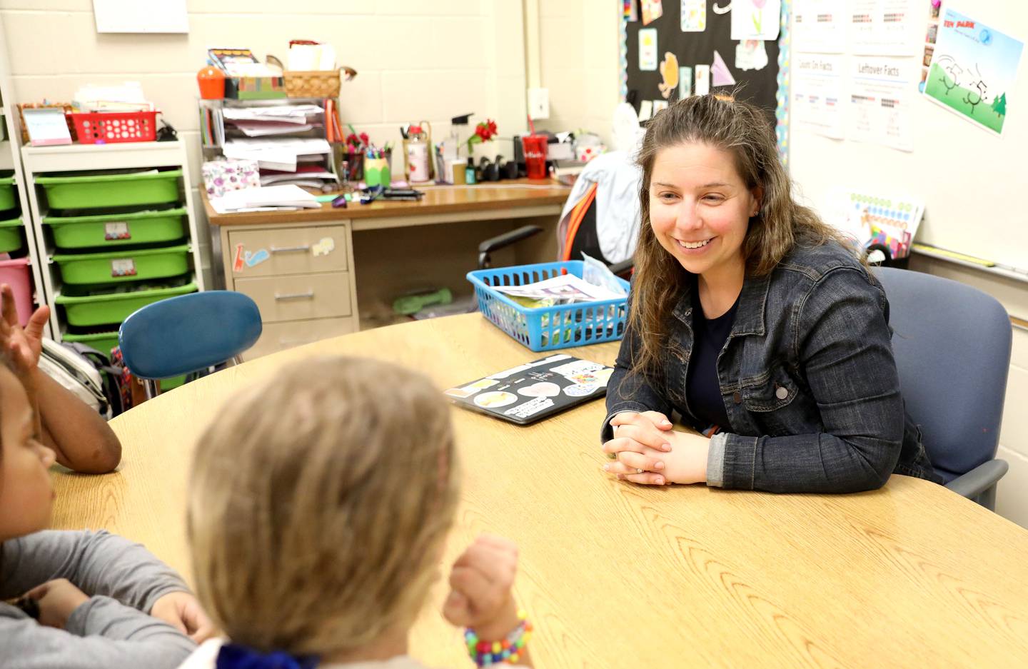Indian Trail Elementary School interventionist Katie Hurckes works with some of her first graders at the Downers Grove school.Indian Trail Elementary School interventionist Katie Hurckes works with some of her first graders at the Downers Grove school.