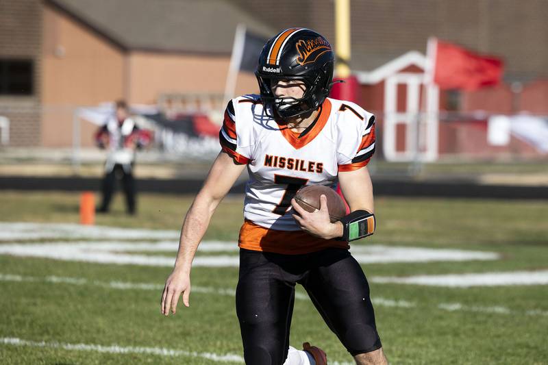 Milledgeville’s Konner Johnson runs the ball against Amboy Saturday, Nov. 15, 2025, in the 8-man football semifinal.
