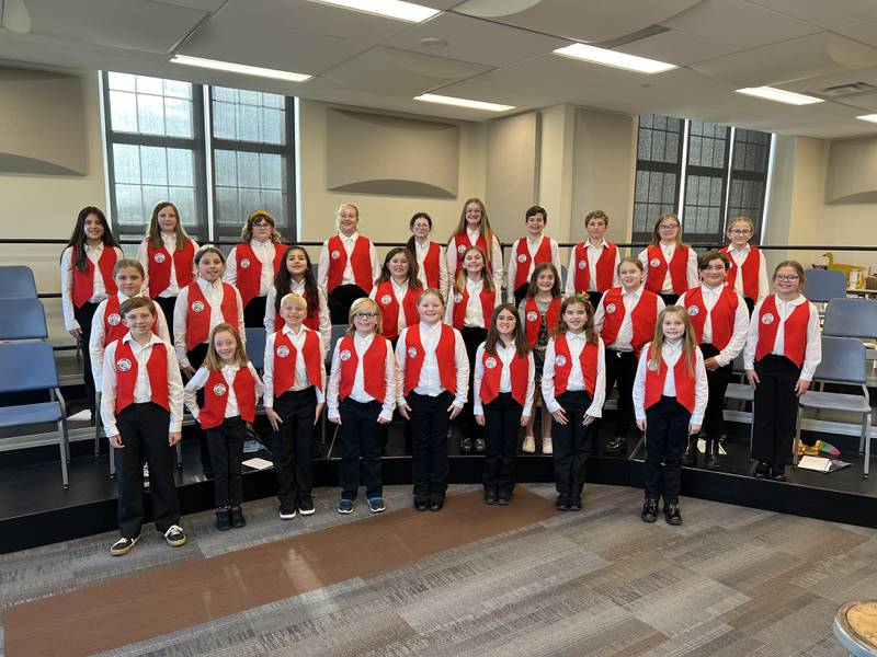 Illinois Valley Youth Choir members are Everly Barr, Brynlen Bock, Avery Bowen, Liam Catalanella, Hayden Davis, Cora Dempsey, Jacie Dobberstein, Adelynn Duke, Marielle Grivetti, Kailey Harper, Nia Jarosz, Jayden Kissinger, Madeline Kramer, Evelynn Lindsey, Blake Maggi, Kennedy McCollom, Liv McGann, Juliet Newell, Aria Olson, Nolan Parker, Austyn Rebholz, Eliana Regan, Cora Roether, Reuben Roether, Ellyn Schmidt, Johan Theisinger, Rosalie Villareal, and Vada Walton. The choir is directed by Jenilyn Roether and accompanied on piano by Matt Makeever.