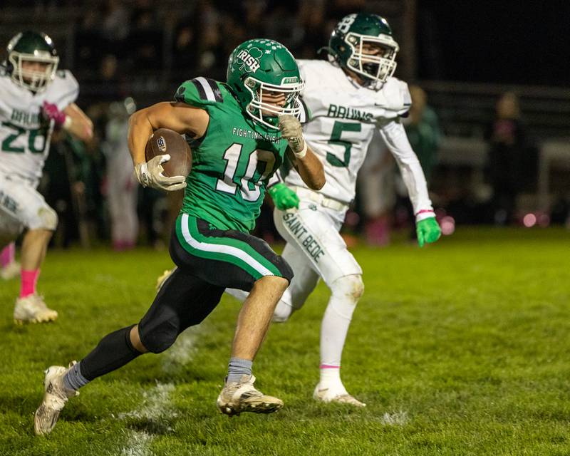 Liam Knoebel (10) of Seneca runs ball as Chase Riva (5) of St. Bede trails on Friday, Oct. 10, 2025 at Seneca High School in Seneca.