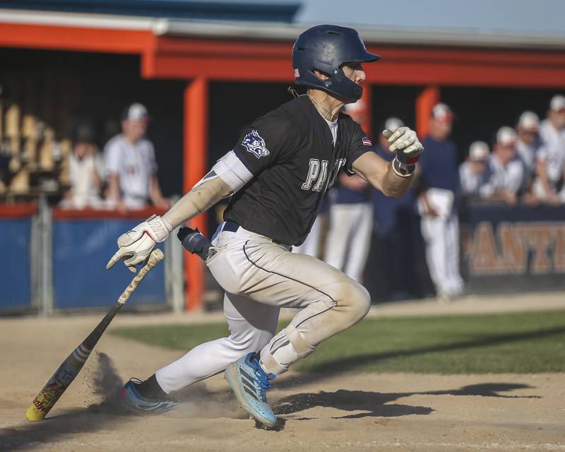 Oswego East's Dominic Battista (14) takes off to first afte connecting on a pitch during baseball game Oswego East at Oswego.  May 14, 2026 in Oswego.