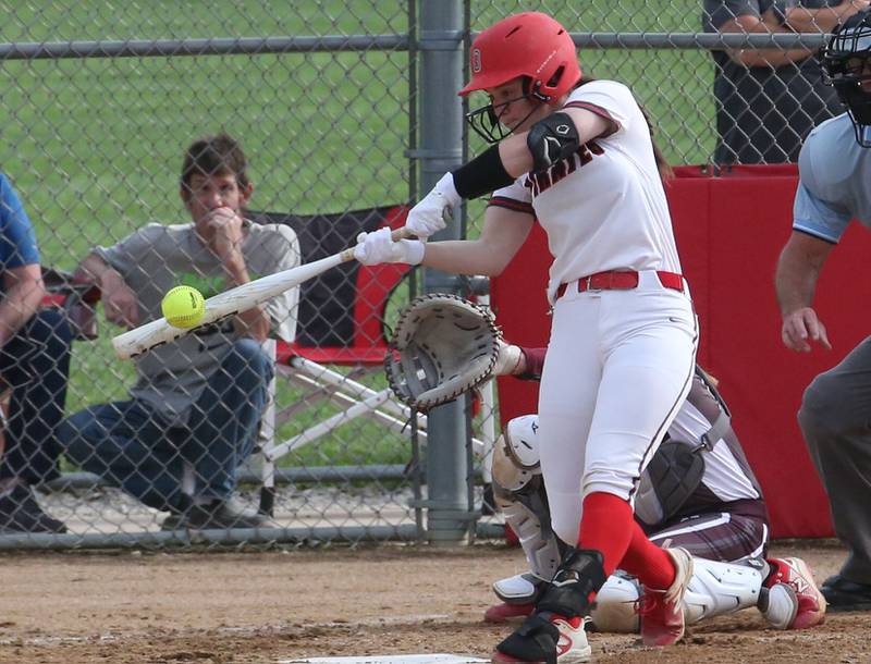 Ottawa's Maura Condon smacks a hit against Morris on Monday, May 15, 2023 at Ottawa High School.