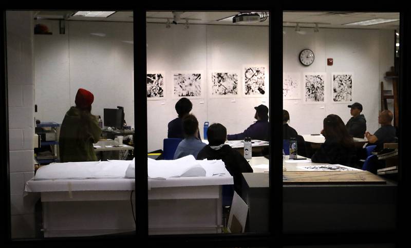 Artists discusses the their art on Thursday, Feb, 6, 2025, during an art class at McHenry County College.