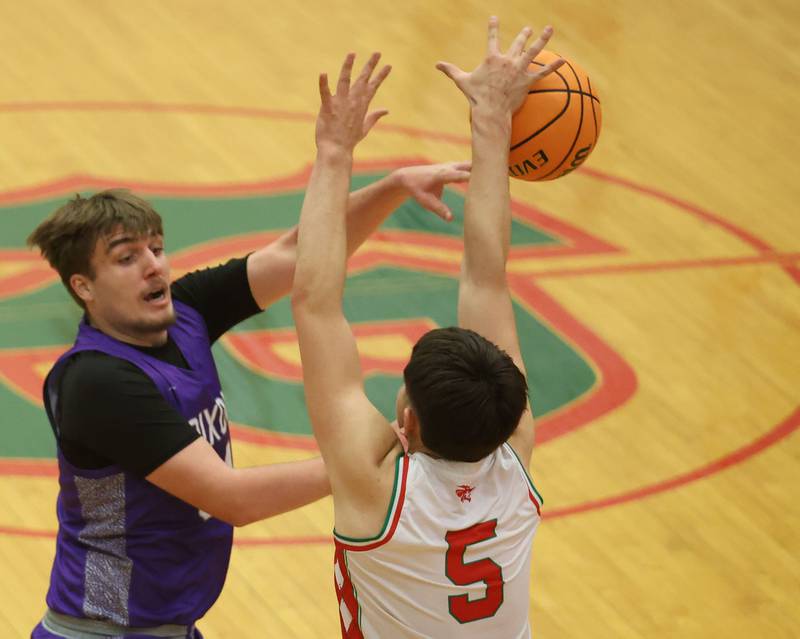 L-P's Erick Sotelo blocks a pass from Dixon's Jakob Nicklaus during the Class 3A Regional semifinal game on Wednesday, Feb. 25, 2026 in Sellett Gymnasium at L-P High School.