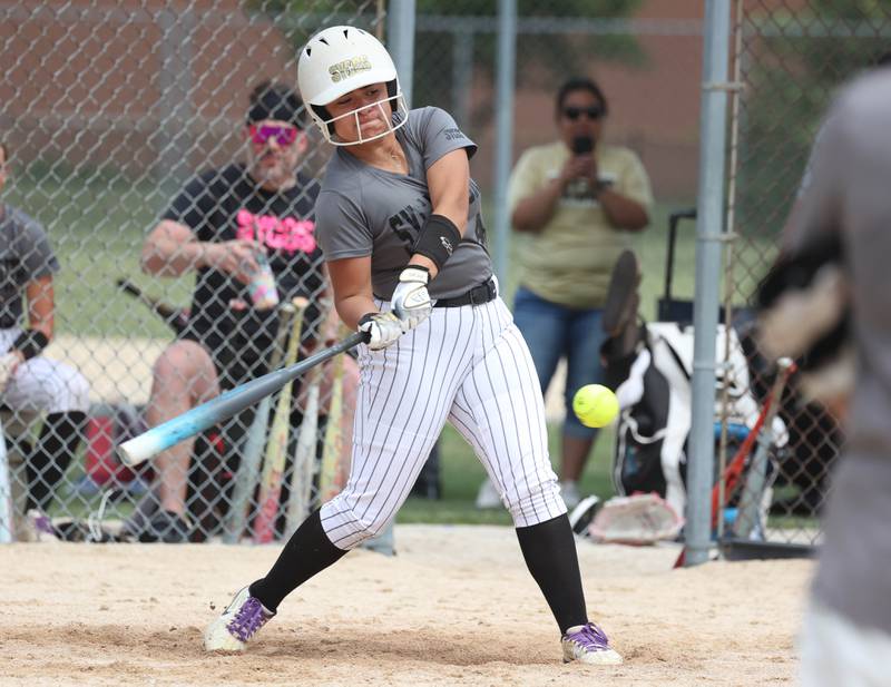Sycos’ Jasmine Rodriguez hits a home run Friday, June 27, 2025, during their 16u game against Select Fastpitch in the Storm Days tournament at the Sycamore Community Sports Complex.