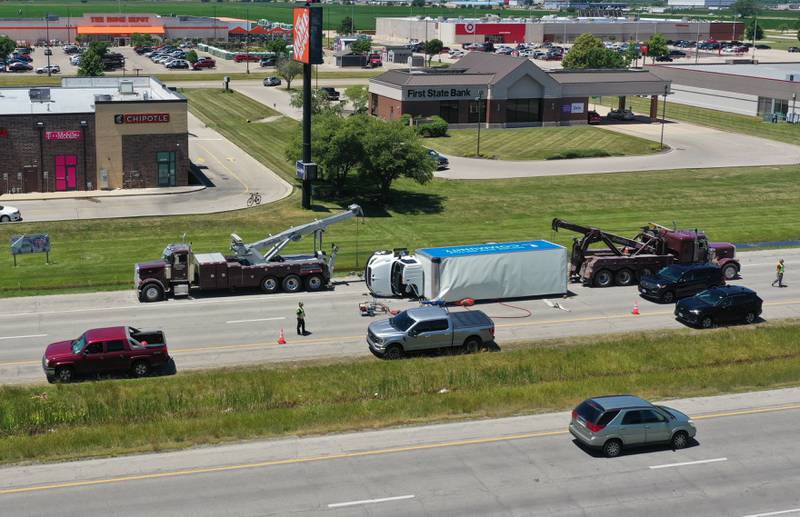 Crews work the scene of a semi truck crash on Friday, June 14, 2024 near the intersection of 38th Street and Illinois 251 in Peru. A Goodwill semi truck overturned and extrication was needed. The crash happened shortly before 11:30a.m. Illinois Route 251 was down to one lane. Peru police believe injuries were not serious.