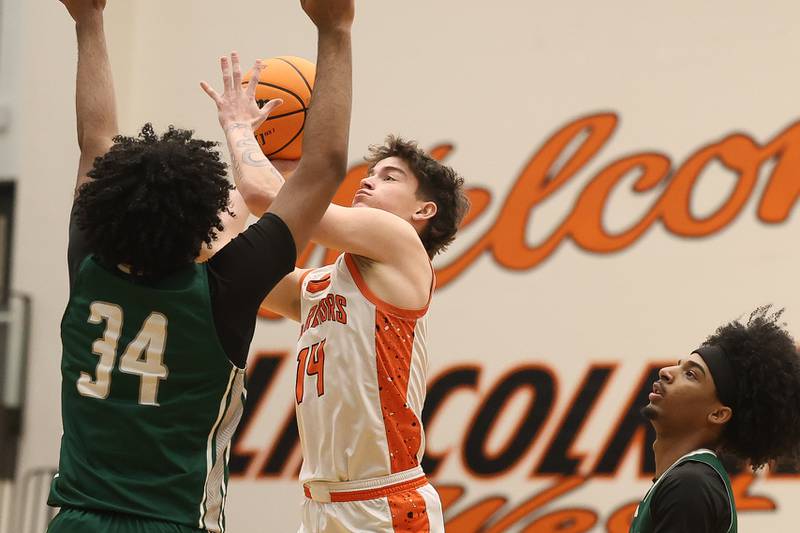 Lincoln-Way West’s Drake Been goes in for the contested shot against Plainfield Central on Saturday, Jan 3, 2026 in New Lenox.