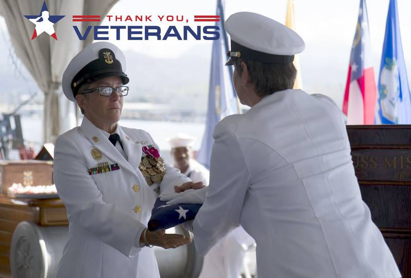 Pacific Fleet Master Chief Susan Whitman ceremoniously accepts the ensign during an “Old Glory” presentation at her Change of Office and Retirement Ceremony, aboard the USS Battleship Missouri Memorial in 2018 at Joint Base Pearl Harbor Hickam. Whitman retires as the 17th Fleet Master Chief of the U.S. Pacific Fleet after more than 32 years of Naval Service. Whitman turns over the position as the fleet's senior enlisted leader to Fleet Master Chief James Honea.