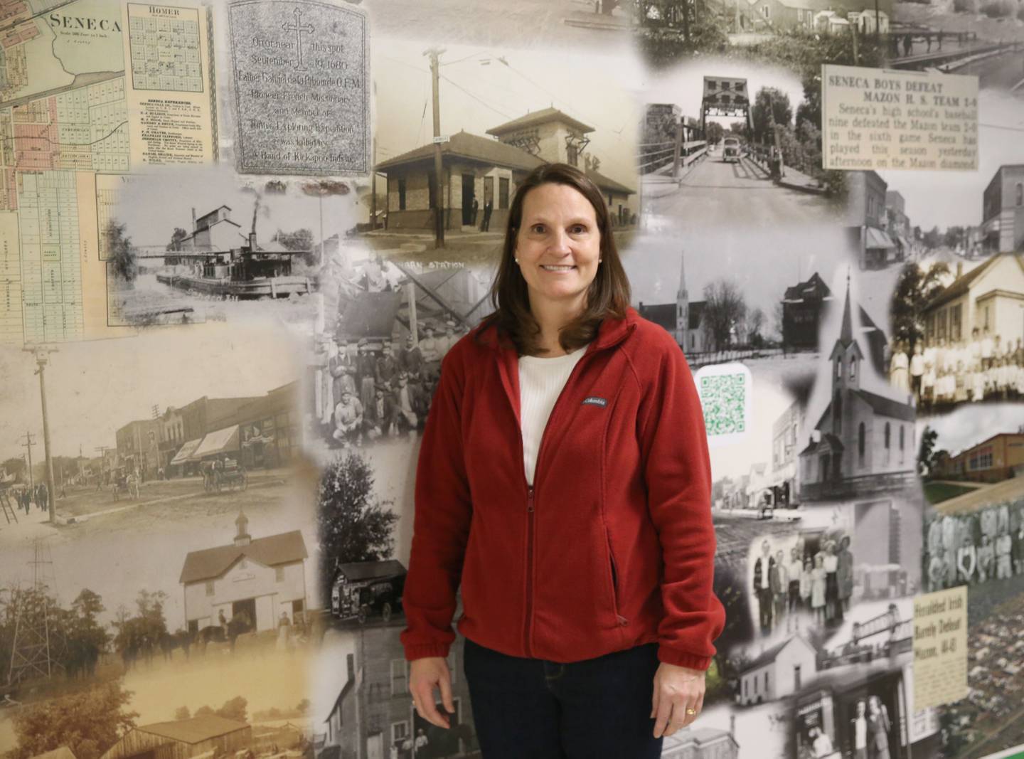 Mrs. Jenna Maierhofer poses for a photo in front of a mural on Tuesday, March 18, 2025 at Seneca High School.