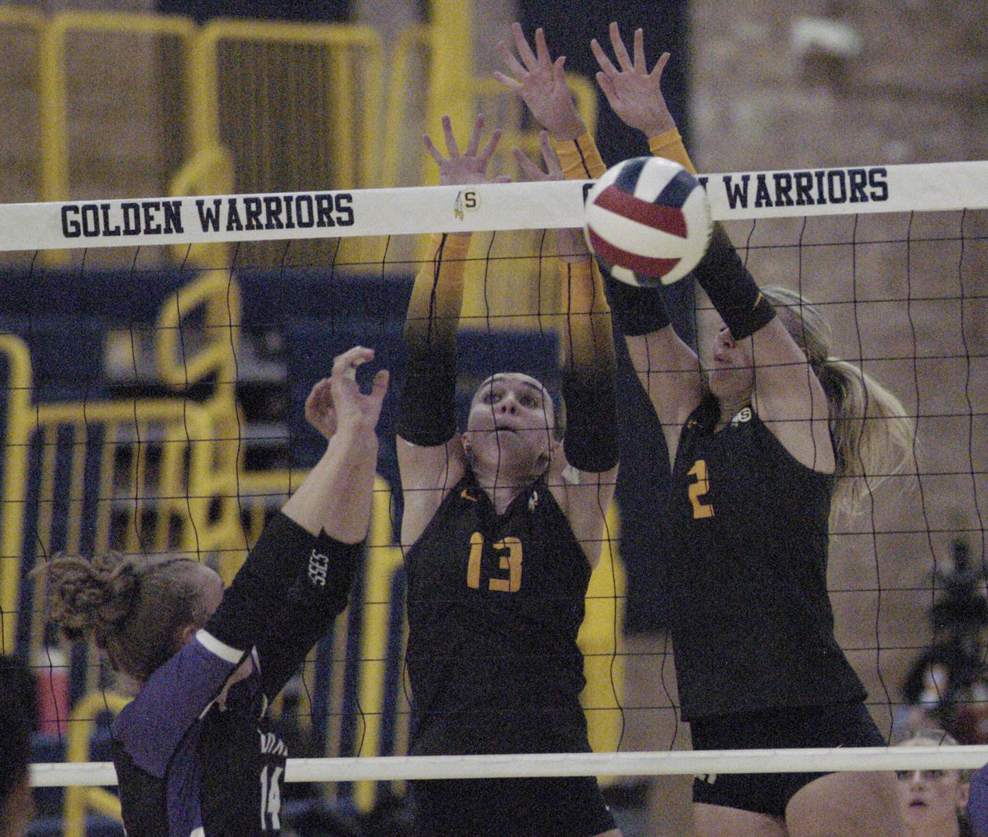 The Volleyball is blocked by Sterling's Sydney Giffin and Grace Johnson. Sterling hosted Dixon in Volleyball on August 26, 2025 at Musgrove Fieldhouse.