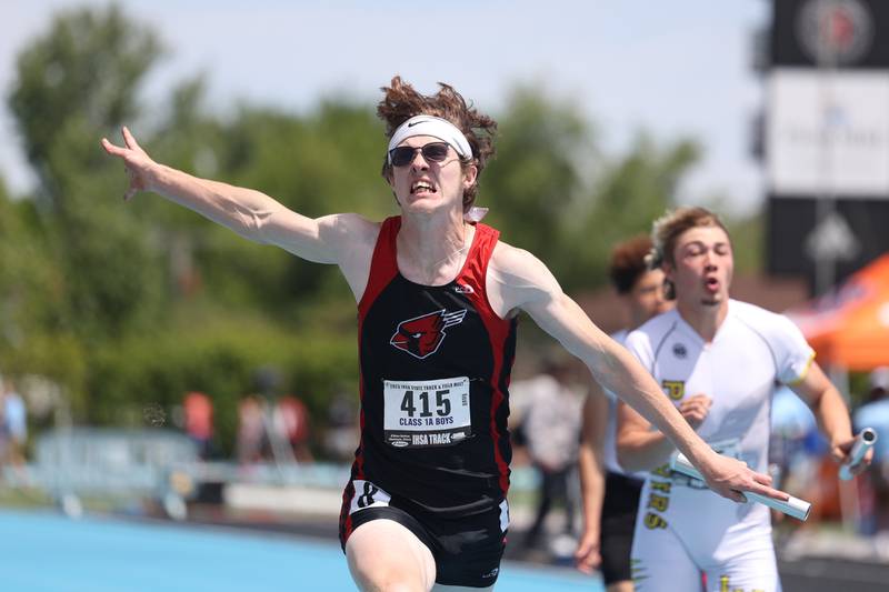 Forreston-Polo’s Michael Taylor lunges as he crosses the finish line for first place in the Class 1A 4x100 Relay State Finals on Saturday, May 27, 2023 in Charleston.