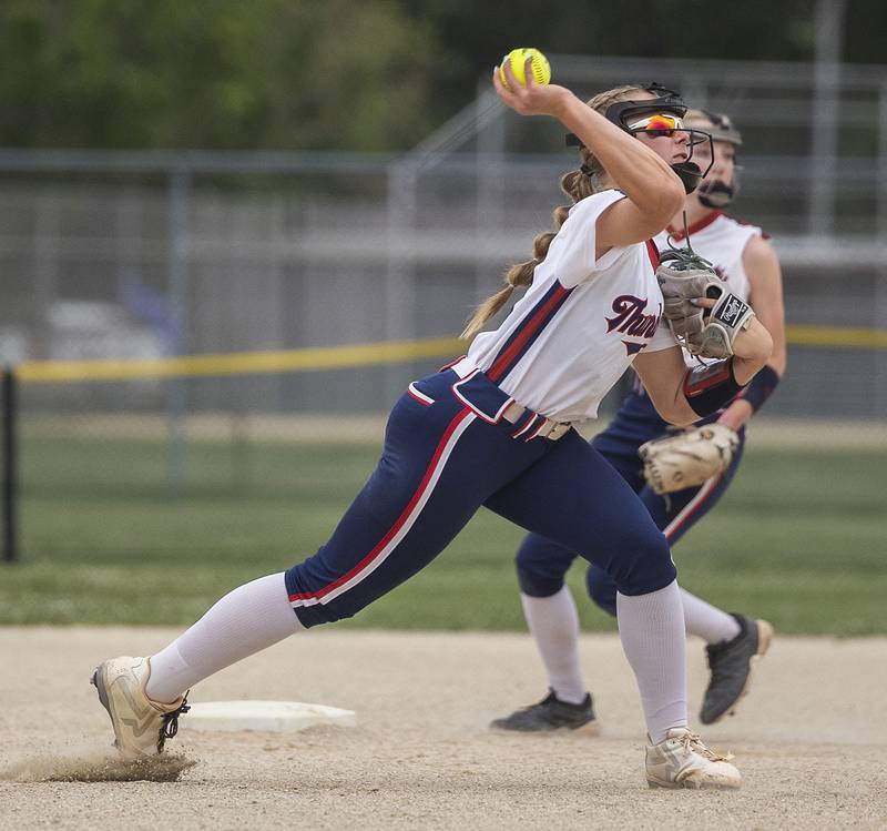 Belvidere North’s Miley Dobbs throws to first for an out  against Sterling Friday, May 30, 2025, in the Class 3A Regional final in Dixon.