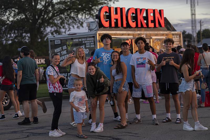 Friends gather for a photo Wednesday, July 3, 2024 at RB&W Park in Rock Falls for the Sterling/Rock Falls Jaycee’s fireworks show.