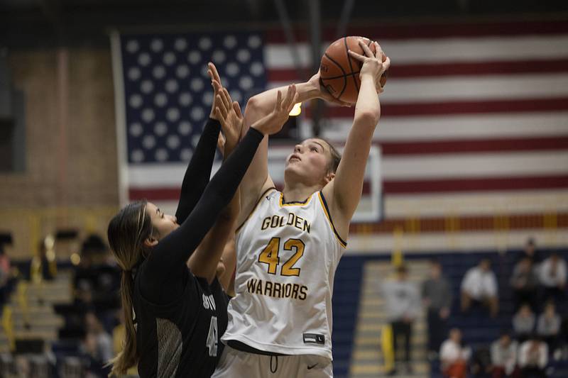 Sterling’s Madison Austin puts up a shot against Galesburg’s Josslyn Peck on Wednesday, Feb. 8, 2023.