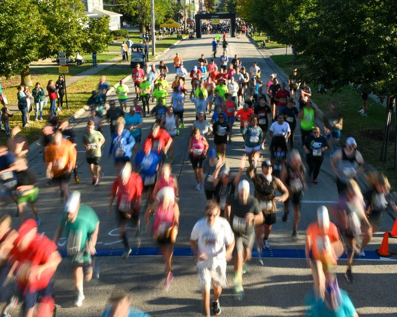 DeKalb Corn Classic 10K racers take off during the start of the race on Sunday, Sept. 29, 2024 held in downtown DeKalb.