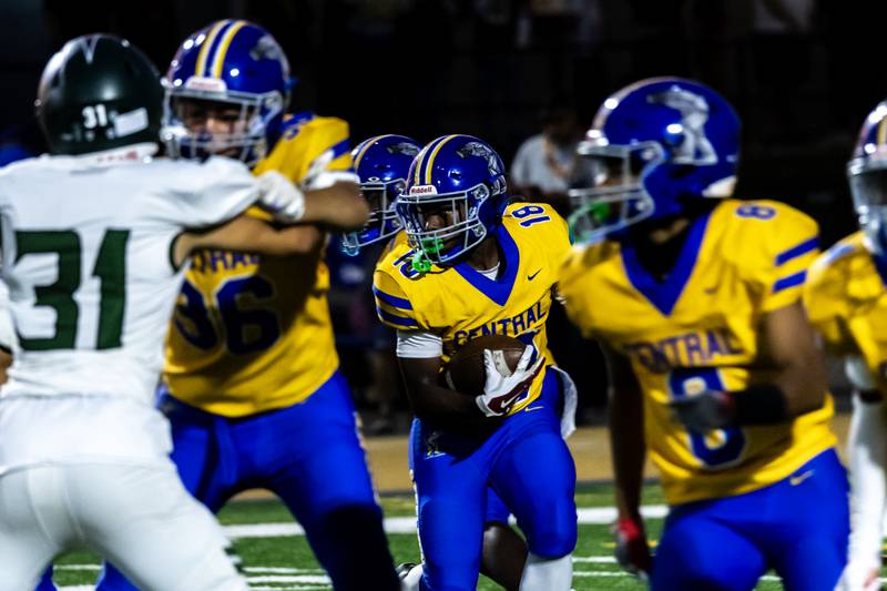 Joliet Central's Tristen Sellers looks for an opening during a varsity football home game against Plainfield Central on Sept. 26, 2025.