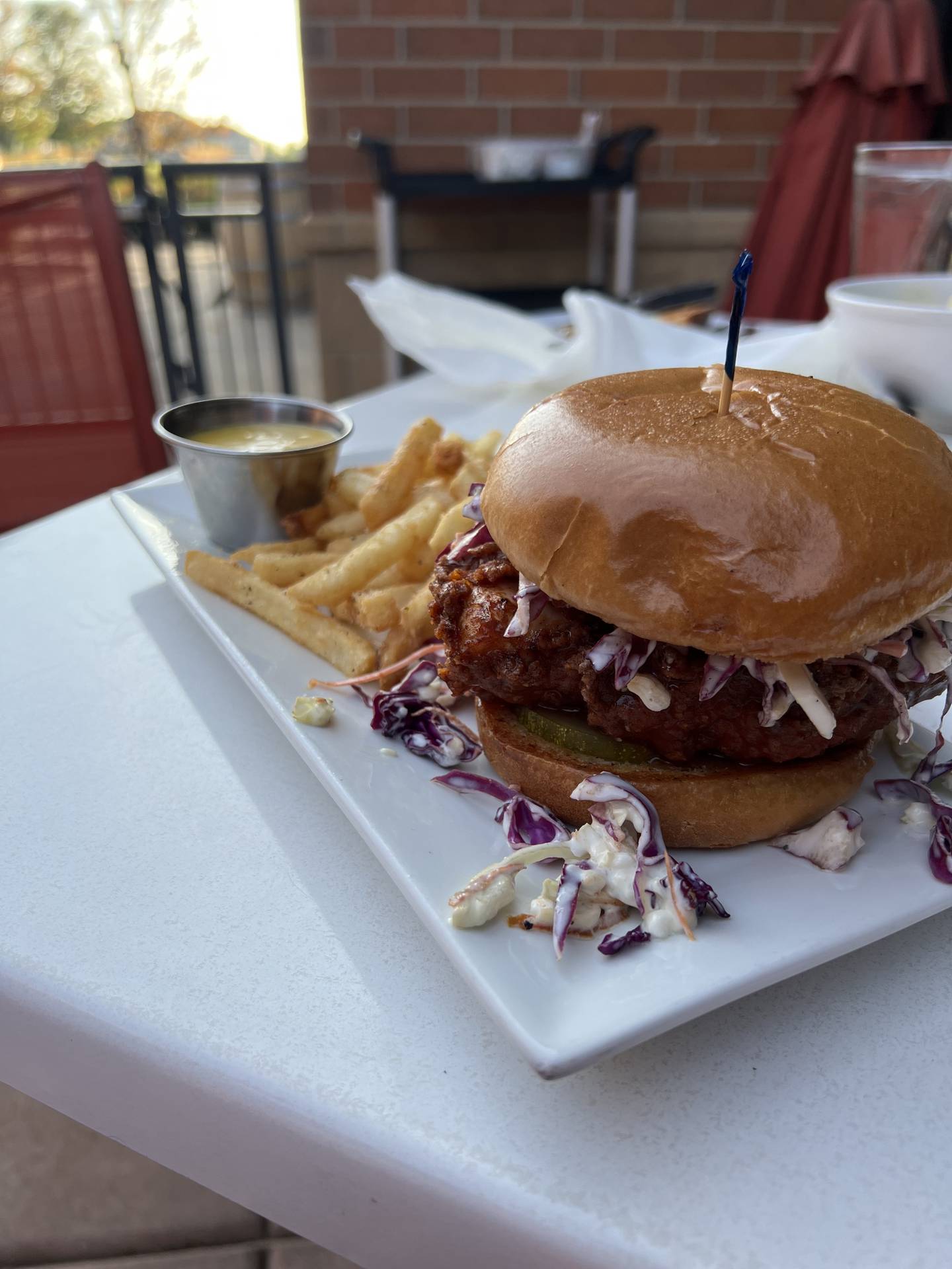 The Nashville hot chicken sandwich at Village Vintner Winery and Brewery is topped with pickles and a unique blue cheese coleslaw.