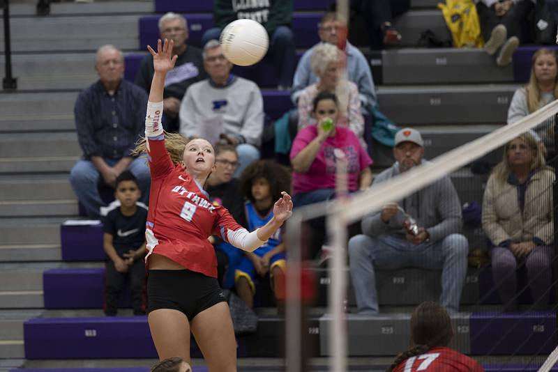 Ottawa’s Skylar Dorsey makes a hit in the regional semifinal Tuesday, Oct. 25, 2022 against Dixon.