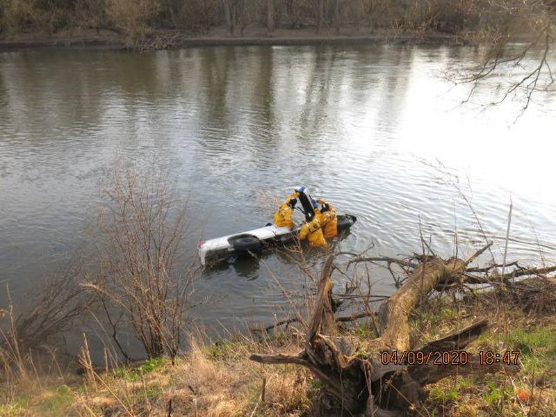 Riverside firefighters rescue the driver a pickup truck who reportedly lost control of the vehicle and drove into the Des Plaines River. Photo provided