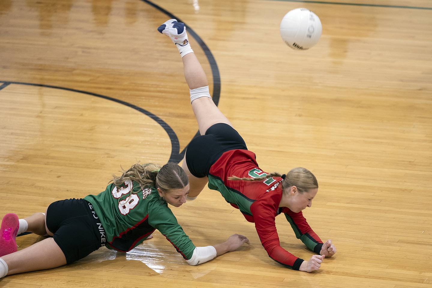 Lasalle-Peru’s Aubrey Duttlinger (left) and Kalli Ware trip over one another against Rock Falls Wednesday, Sept. 4, 2024, at Rock Falls High School.